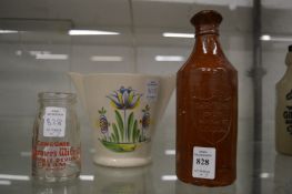 A stoneware bottle impressed Dairy Supply Co Ltd, Museum Street, London together with two other