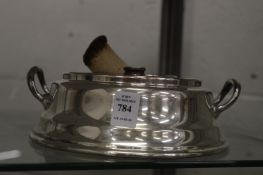 A large plated spirit burner stand.