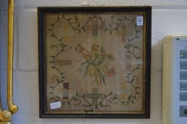 A floral decorated sampler by Jemima Sowter, dated 1807.