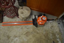 A Stihl HS45 petrol hedge cutter.