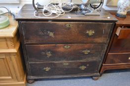 An 18th century oak three drawer chest.
