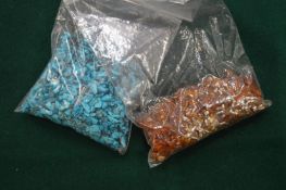 A group of turquoise and amber beads.