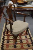 A good Georgian style mahogany small armchair with vase shaped back splat and rams head carved