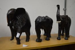 Three model elephants.