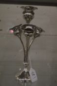 A silver four branch bud vase.