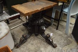 Carved wood table base.