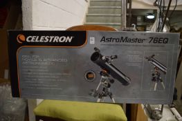 A Celestron Astro Master 76EQ telescope, boxed, unused.