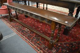 A pair of oak bench seats.