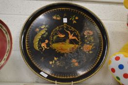 A Toleware circular tray.