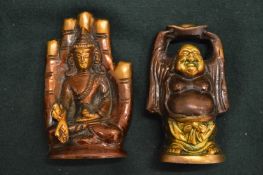 Two small bronze buddhas.