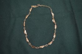A 9ct gold necklace.
