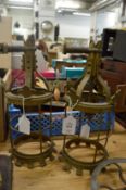 A pair of brass hanging lanterns.