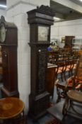 Joseph Wright Warwick, a 30 hour longcase clock with carved oak case.