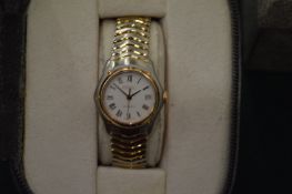 A ladies Ebel wristwatch with original box.