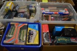 A large collection of boxed Corgi and other model cars, trams etc.