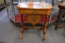 A good Victorian walnut work table with presentation inscription.