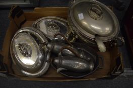 A large plated tureen cover and ladle, two entree dishes and covers and other items.