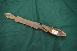 An African carved wood spoon.