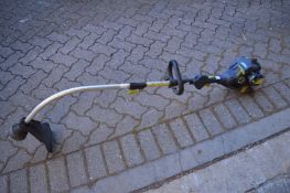 A petrol strimmer.