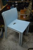 A pair of Jasper Morrison Air Chairs, pale blue colour.