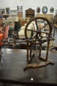 An old spinning wheel.