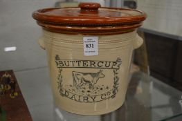 A Buttercup Dairy Co 5lb earthenware jar and cover.