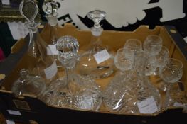 A collection of glass decanters, brandy glasses, large cut glass bowl etc.