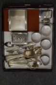 A silver cigarette case, a vesta case, embossed silver snuff box, napkin rings and other items.