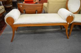 A modern upholstered window seat.