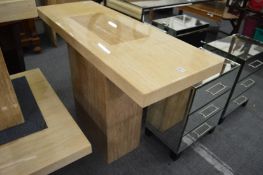 A stylish lacquered marble pedestal console table.