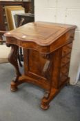 A Victorian walnut Davenport.