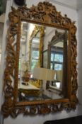 A good large decorative carved oak framed pier mirror.