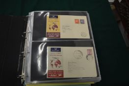 Album containing numerous first day covers.