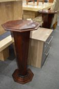 A pair of Art Deco style octagonal shaped stands.