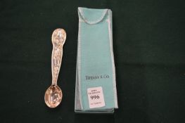 A Tiffany & Co Christening spoon with original pouch and box.