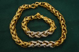 A heavy diamonte set necklace and bracelet.