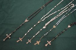 A collection of rosary's.