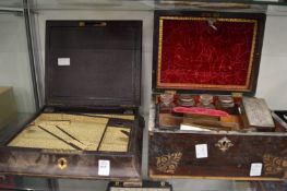 A leather writing box and a dressing table box (faults).
