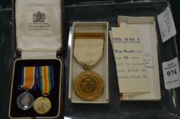 Cased set of miniature medals and a Red Cross medal.