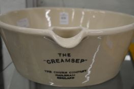 A good cream separating bowl 'The Creamsep' manufactured by the Churn Co, Hailsham, England.