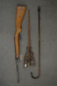 A bayonet with leather frog, a Webley Junior air rifle and a walking stick.