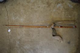 A split cane two piece fly rod.