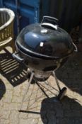A large Weber barbecue.