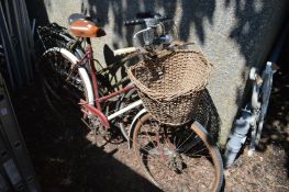 Two ladies bicycles.