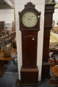 A 19th century mahogany longcase clock with 8 day movement, later painted circular dial, signed