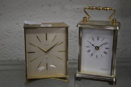 Two quartz clocks.
