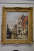 Continental street scene with figures by a canal, oil on canvas, in a decorative frame.