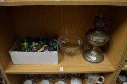 Toys, cut glass bowl and a lamp.