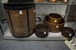 A good twin handled bushel measure together with four other measures to include a gallon, a peck,