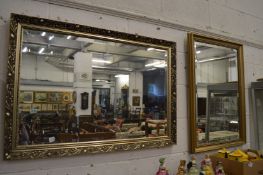 Two gilt framed mirrors.